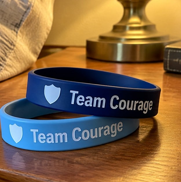 Customer photo of custom team bracelets